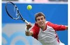 EASTBOURNE, ENGLAND - JUNE 14: Remi Boutillier of France plays a forehand against Ken Skupsi of Great Britain during their Men's Singles qualifying match on day one of the Aegon International at Devonshire Park on June 14, 2014 in Eastbourne, England.  (Photo by Steve Bardens/Getty Images)